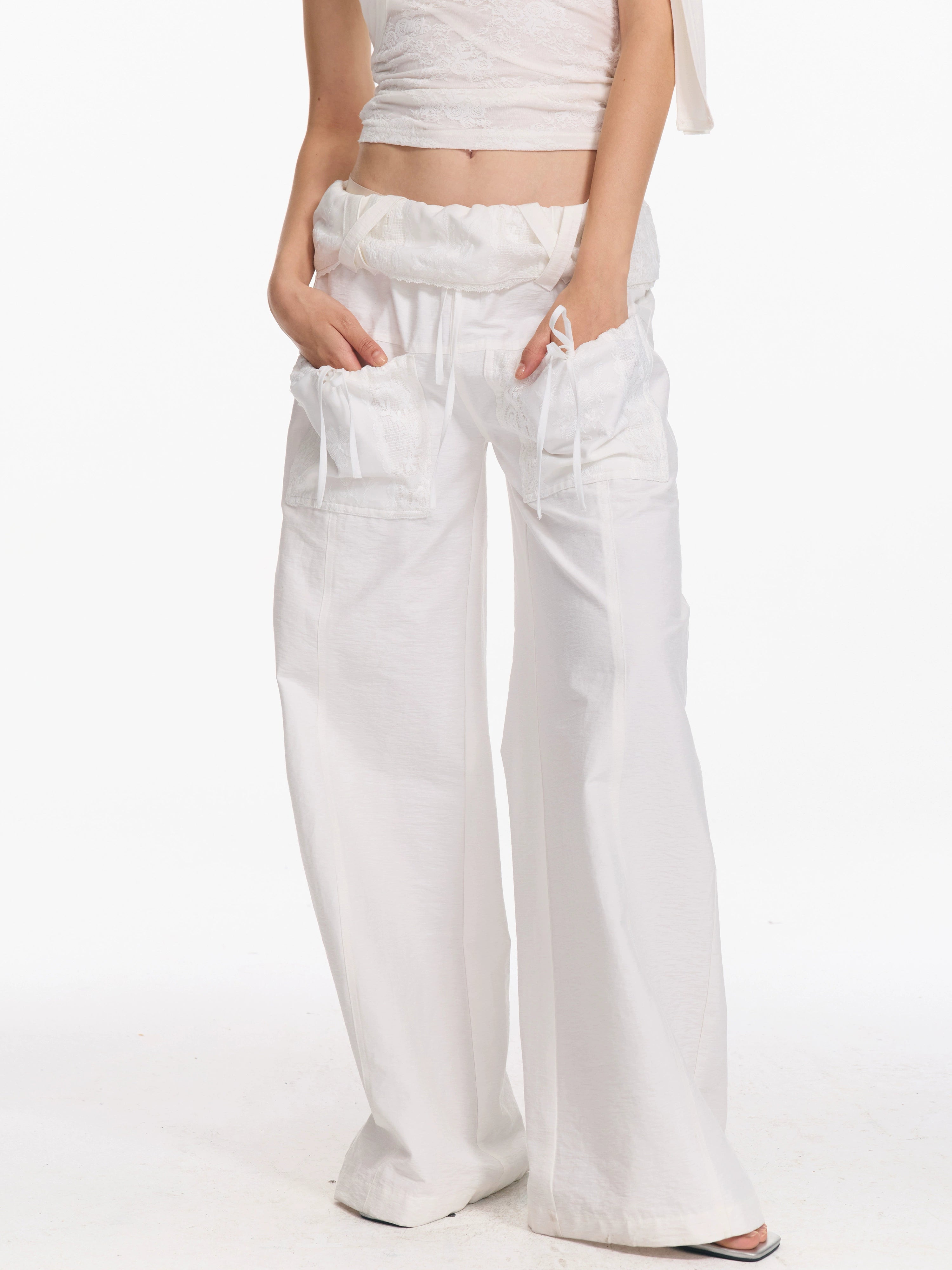 2th Desire 翻折泡泡感腰头系带立体口袋弯刀宽松休闲垂感长裤女