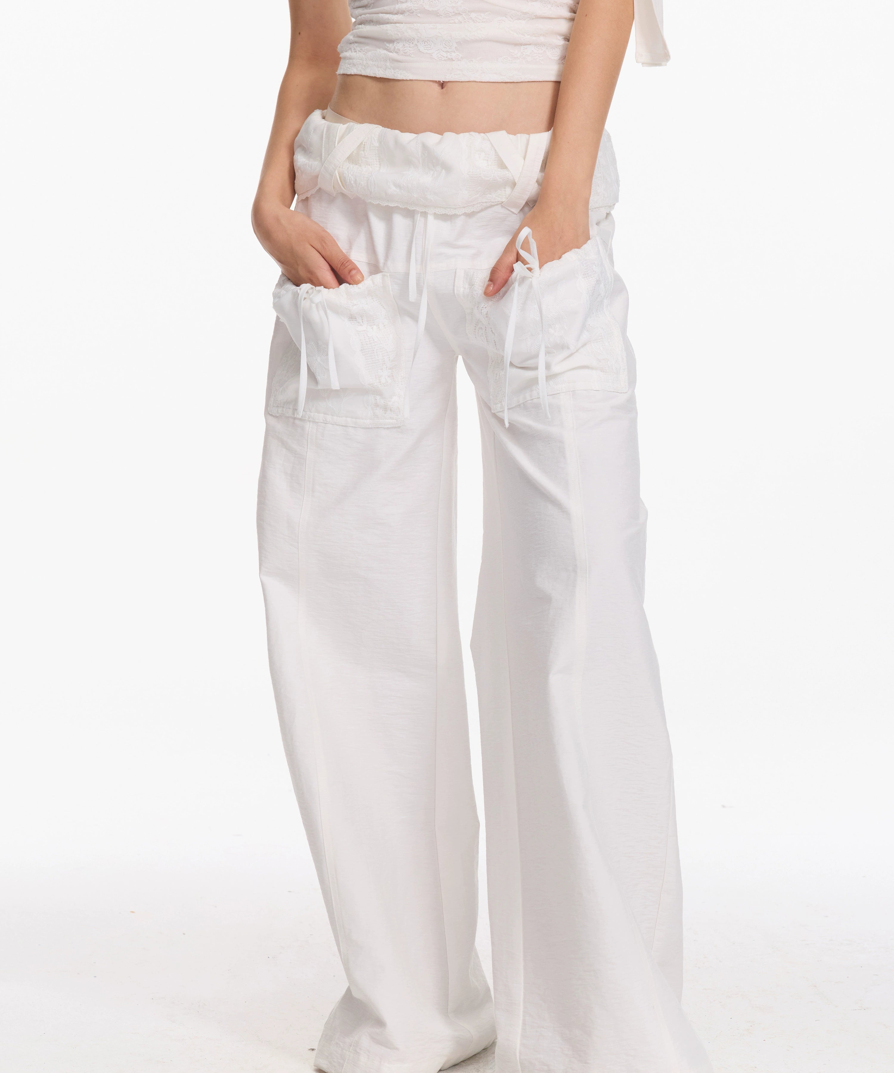 2th Desire 翻折泡泡感腰头系带立体口袋弯刀宽松休闲垂感长裤女